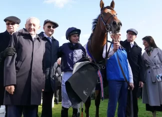 Aidan O’Brien (far left) with Ryan Moore and winning connections of City Of Troy (Tim Goode for The Jockey Club)